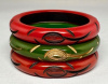 BB457 red, paprika & green carved & overdyed bakelite bangles